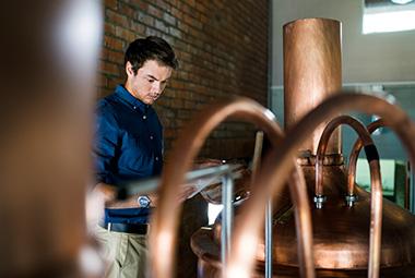 Man checking over brewery - AGLC - Operate your business